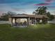 Outdoor space featuring a covered patio and a screened-in porch, perfect for entertaining or relaxing at 8324 Nightingale Rd, Weeki Wachee, FL 34613