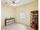 Well-lit bedroom with ample storage and a ceiling fan, providing comfort and convenience at 8324 Nightingale Rd, Weeki Wachee, FL 34613