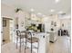 Charming eat-in kitchen features a bar with seating, modern appliances, and easy access to other living spaces at 8324 Nightingale Rd, Weeki Wachee, FL 34613