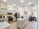 Kitchen featuring stainless appliances, kitchen island and breakfast nook at 8324 Nightingale Rd, Weeki Wachee, FL 34613