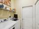 This is a laundry room with a washing machine and a dryer at 8324 Nightingale Rd, Weeki Wachee, FL 34613