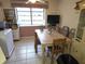 Eat in kitchen area with lots of natural light, and tile floors at 9056 Horizon Dr, Spring Hill, FL 34608