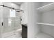 Elegant bathroom with glass shower and stylish mosaic tile flooring at 9201 Nightingale Rd, Weeki Wachee, FL 34613