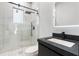 Modern bathroom featuring a glass-enclosed shower and stylish vanity at 9201 Nightingale Rd, Weeki Wachee, FL 34613
