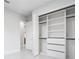 Bright walk-in closet with custom shelving and storage solutions at 9201 Nightingale Rd, Weeki Wachee, FL 34613