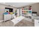 Functional craft room with organized storage, workspace, and natural light for creative endeavors at 1009 Almondwood Dr, Trinity, FL 34655