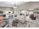 Open-concept living area with seamless flow to kitchen and dining spaces at 1009 Almondwood Dr, Trinity, FL 34655