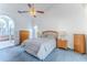 Bright main bedroom with large window and ensuite bathroom at 10285 Rosetti Ct, Spring Hill, FL 34608