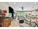 Spacious living room offering ample seating, large windows, and an open floor plan at 11101 Ragsdale Ct, New Port Richey, FL 34654