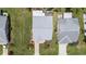 Aerial view of home with a landscaped yard and driveway at 11621 Pear Tree Dr, New Port Richey, FL 34654