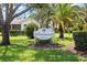 Arborwood at Summertree sign surrounded by landscaping at the entrance of the property at 11621 Pear Tree Dr, New Port Richey, FL 34654