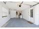 Spacious, clean garage with laundry area and utility connections at 11621 Pear Tree Dr, New Port Richey, FL 34654