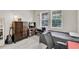 Comfortable bedroom featuring cozy carpeting and ample natural light at 11876 Ranchers Gap Dr, Odessa, FL 33556