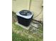 Exterior ground-level image of the AC unit at 12104 Boynton Ln, New Port Richey, FL 34654