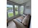 Relaxing sun room with peaceful views of the pond at 12104 Boynton Ln, New Port Richey, FL 34654