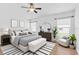 Beautifully furnished bedroom with natural light and modern accents at 13600 Crest Lake Dr, Hudson, FL 34669