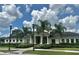 Community clubhouse, showcasing its well-maintained exterior and inviting entrance at 13600 Crest Lake Dr, Hudson, FL 34669