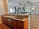 Community kitchen with granite countertops, stainless steel appliances, and a spacious open floorplan at 13600 Crest Lake Dr, Hudson, FL 34669