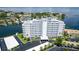 An aerial view of the exterior of the condo community surrounded by manicured landscaping and water at 1365 Snell Isle Ne Blvd # 1B, St Petersburg, FL 33704