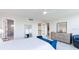 Bright bedroom has doors to the walk in closet and the bathroom at 1365 Snell Isle Ne Blvd # 1B, St Petersburg, FL 33704