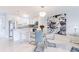 Bright, modern kitchen with white cabinets, stainless steel appliances, and elegant backsplash at 1365 Snell Isle Ne Blvd # 1B, St Petersburg, FL 33704