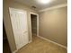 Hallway features tile floor and is painted with neutral color at 1392 Piper Rd, Spring Hill, FL 34606