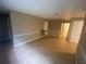 Spacious living room with decorative trim and tile flooring throughout the house at 1392 Piper Rd, Spring Hill, FL 34606