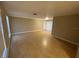 View of living room that includes tile floors, neutral walls and window for natural light at 1392 Piper Rd, Spring Hill, FL 34606