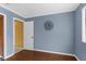 Well-lit bedroom with wood floors, neutral paint, and plenty of natural light at 1430 Rosetree Ct, Clearwater, FL 33764