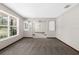 Open-concept room with carpeted floors, neutral walls, and an easy flow into other spaces at 14645 Spellman Ct, Spring Hill, FL 34610