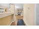 Bright and open living room area with hardwood floors and comfortable seating at 15004 Middle Fairway Dr, Spring Hill, FL 34609