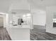 Spacious kitchen with large island, stainless steel appliances and an open concept floor plan at 15430 Oakcrest Cir, Brooksville, FL 34604