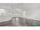 Spacious living room leading into the kitchen at 15430 Oakcrest Cir, Brooksville, FL 34604