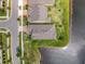 Bird's eye view of a property backing onto a lake, highlighting privacy and waterfront access in a residential neighborhood at 18743 W Coastal Shore Ter, Land O Lakes, FL 34638