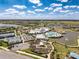 A Primary-planned community with resort-style amenities, including a pool, tennis courts, and scenic waterways at 18743 W Coastal Shore Ter, Land O Lakes, FL 34638