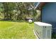 Backyard with a generator and shed at 22850 Skyview Cir, Brooksville, FL 34602