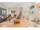 Inviting living room with hardwood floors and large windows allowing plenty of natural light at 22850 Skyview Cir, Brooksville, FL 34602