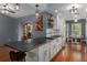 Stylish kitchen with updated fixtures, a breakfast bar, and plenty of counter space at 2295 Rio Cir, Spring Hill, FL 34608
