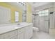 Bathroom with single vanity, sliding glass door shower at 2519 Shipston Ave, New Port Richey, FL 34655