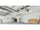 Spacious garage with high ceilings, offering ample room for parking and storage at 2519 Shipston Ave, New Port Richey, FL 34655