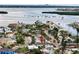 Scenic aerial view of a property nestled amidst lush greenery and waterways at 336 Boca Ciega Dr, Madeira Beach, FL 33708