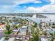 Aerial shot of the neighborhood highlighting proximity to bay at 336 Boca Ciega Dr, Madeira Beach, FL 33708