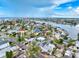Aerial view highlighting the property's canal-front location in waterfront neighborhood at 336 Boca Ciega Dr, Madeira Beach, FL 33708
