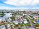 Waterfront neighborhood featuring single Gathering houses and a community waterway and harbor at 336 Boca Ciega Dr, Madeira Beach, FL 33708