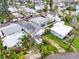 Aerial view of waterfront homes featuring boat docks and canal access at 336 Boca Ciega Dr, Madeira Beach, FL 33708