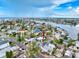 Aerial view of home in a waterfront community, highlighting canal access at 336 Boca Ciega Dr, Madeira Beach, FL 33708