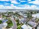 Wide aerial view of the coastal neighborhood and the expansive bay at 336 Boca Ciega Dr, Madeira Beach, FL 33708