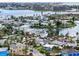 Stunning aerial view of a vibrant coastal community with canals and waterways, close to the ocean and city amenities at 336 Boca Ciega Dr, Madeira Beach, FL 33708