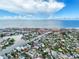 Beautiful aerial view of waterfront community with canal access and homes near the ocean at 336 Boca Ciega Dr, Madeira Beach, FL 33708