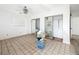 Bedroom with a sliding closet and window at 336 Boca Ciega Dr, Madeira Beach, FL 33708